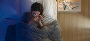 A woman kept awake at night by her allergies